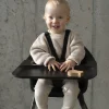USCA_Clikk-25_UGC-imagery_Product-baby-closeup_Black_WarmBrown_938x1072px Stokke Clikk High Chair