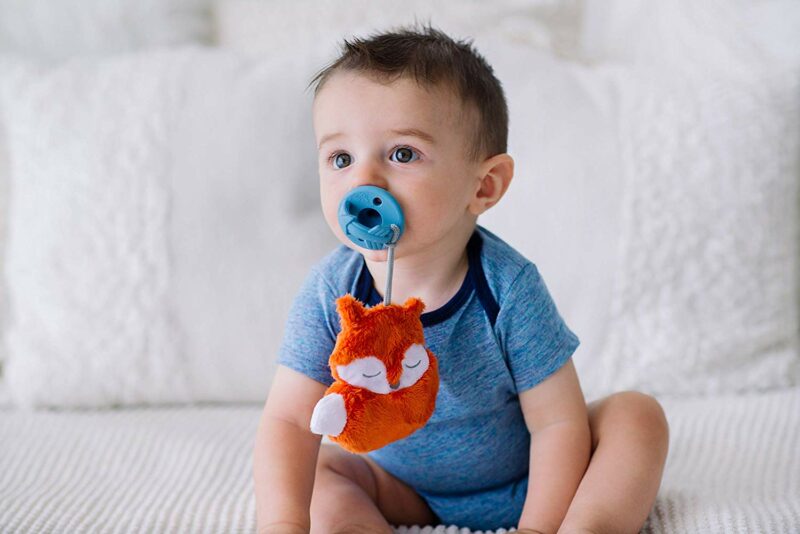 Pacifier with attached animal