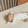 Organic Cotton Side-Snap foldover onesie with peach pattern
