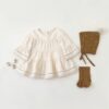 Off-White Baby Dress by Quincy Mae