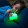 Girl Sleeping with LumiPets Owl Nightlight with Remote and Bluetooth