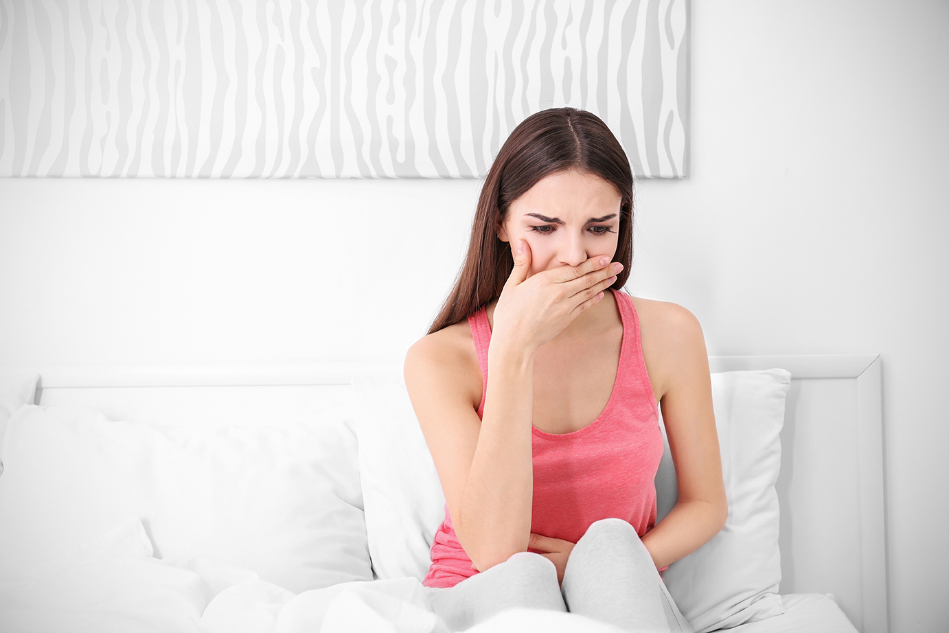 Young Woman Feeling Queasy Early Pregnancy
