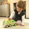 Kid playing with Recycling Truck toy