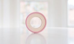 Bannor Toys Silicone Wrapped Wooden Teether in Rose