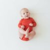 Kyte BABY Long Sleeve Bodysuit in Clementine