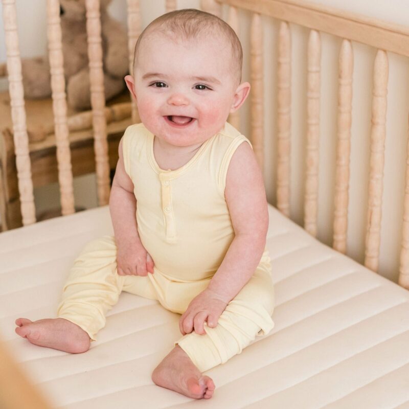 Kyte BABY Sleeveless Bodysuit in Daffodil