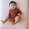 Bib in Rust Tiger from Kyte BABY