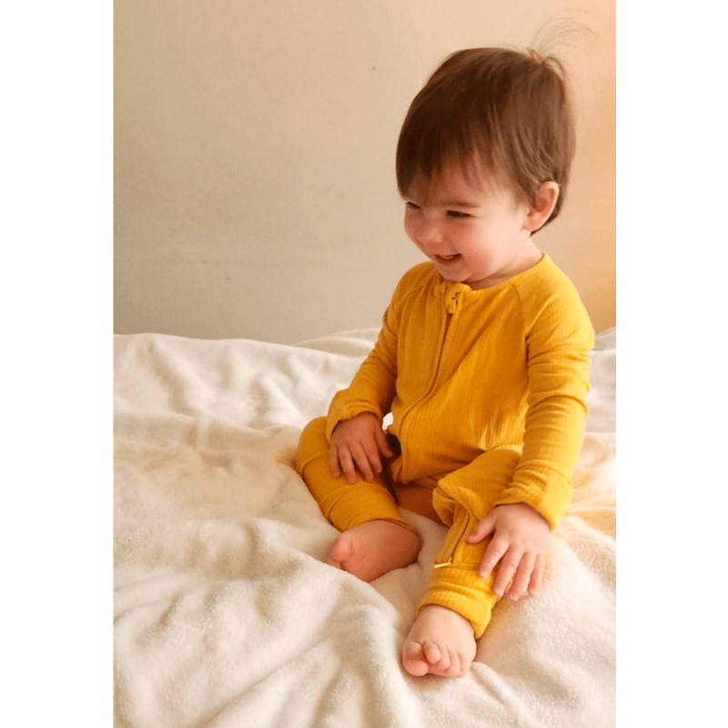 The Golden Child Rompsie from Hanlyn Collective