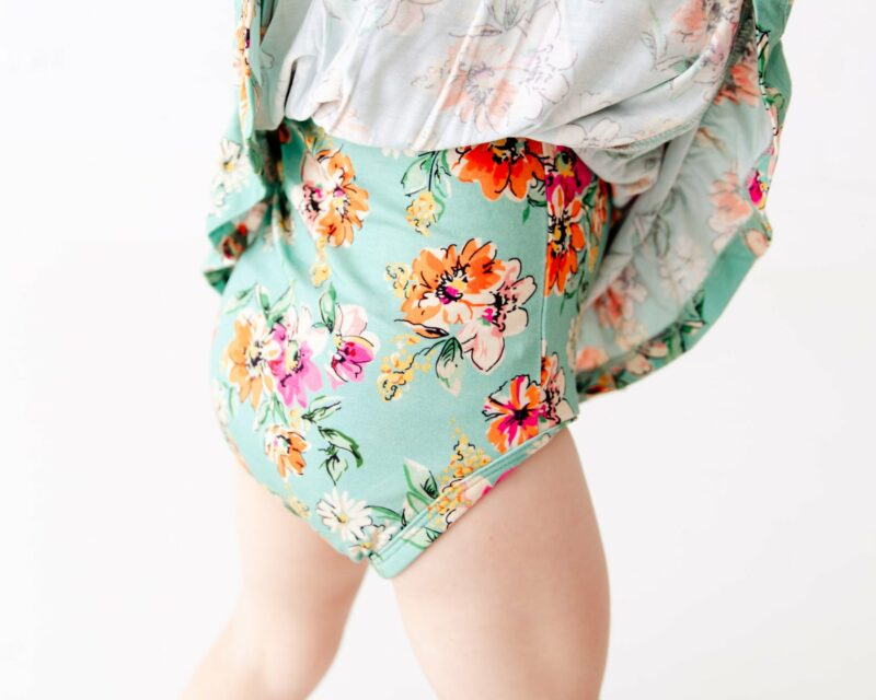 Flower Child Little Bow Bamboo Viscose Bodysuit Twirler available at Blossom