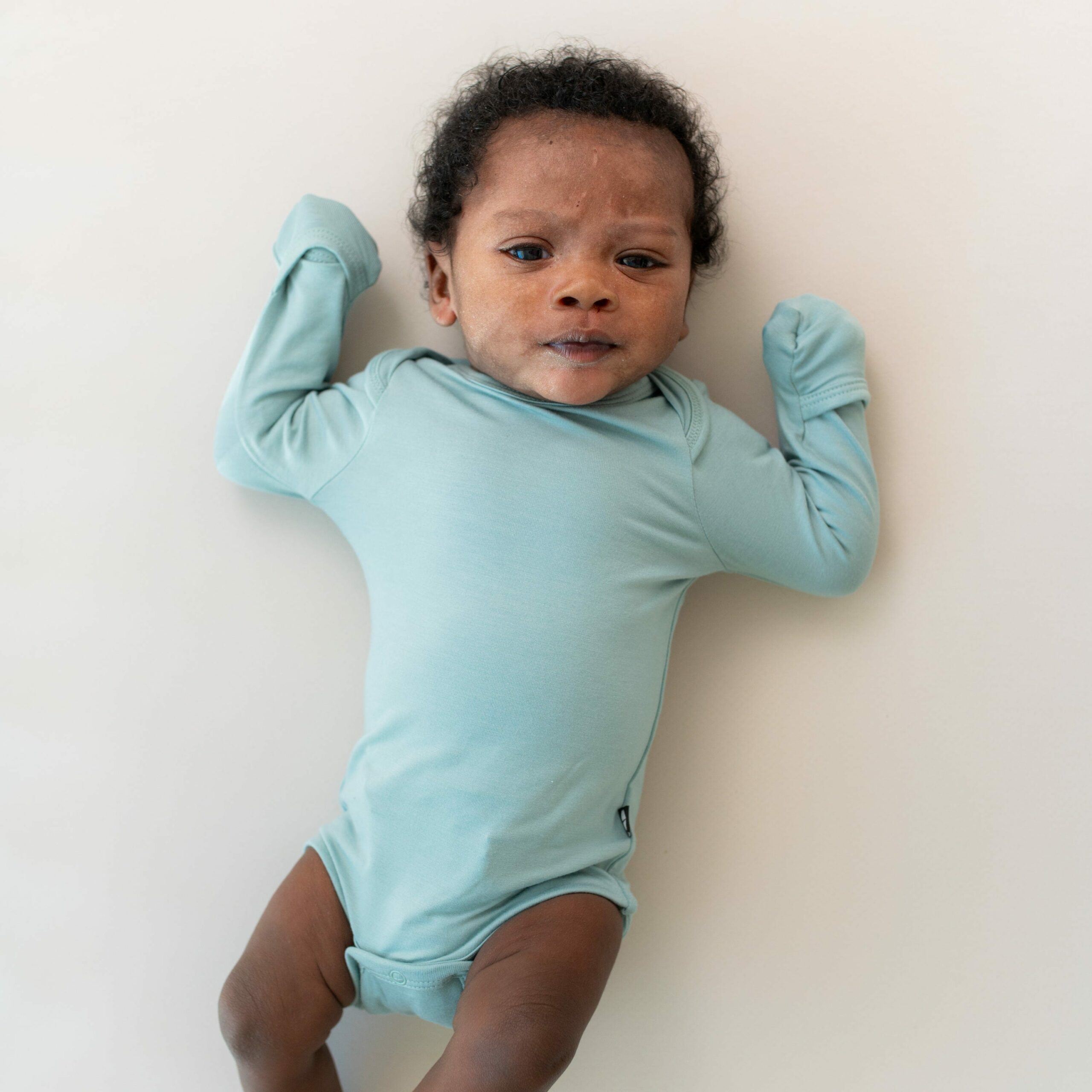 Kyte BABY Long Sleeve Bodysuit in Glacier