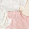 Pointelle Skirted Bodysuit In Melon from Quincy Mae