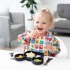 Sleeved Bib: Mickey & Friends Check Mates made by Bumkins