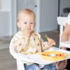 Sleeved Bib: Winnie Loves Hunny from Bumkins