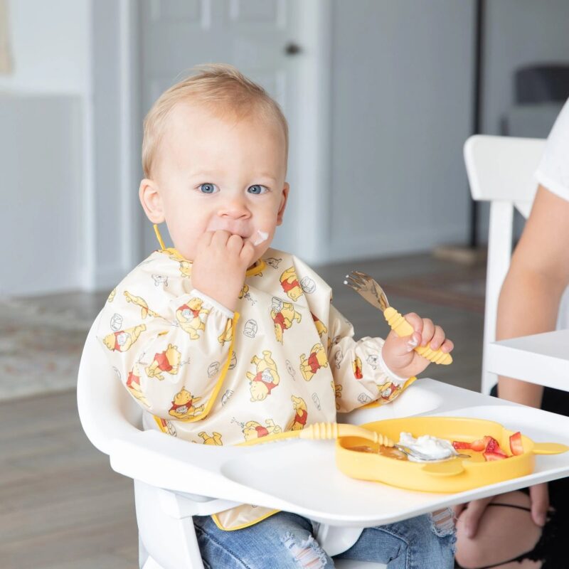 Sleeved Bib: Winnie Loves Hunny from Bumkins