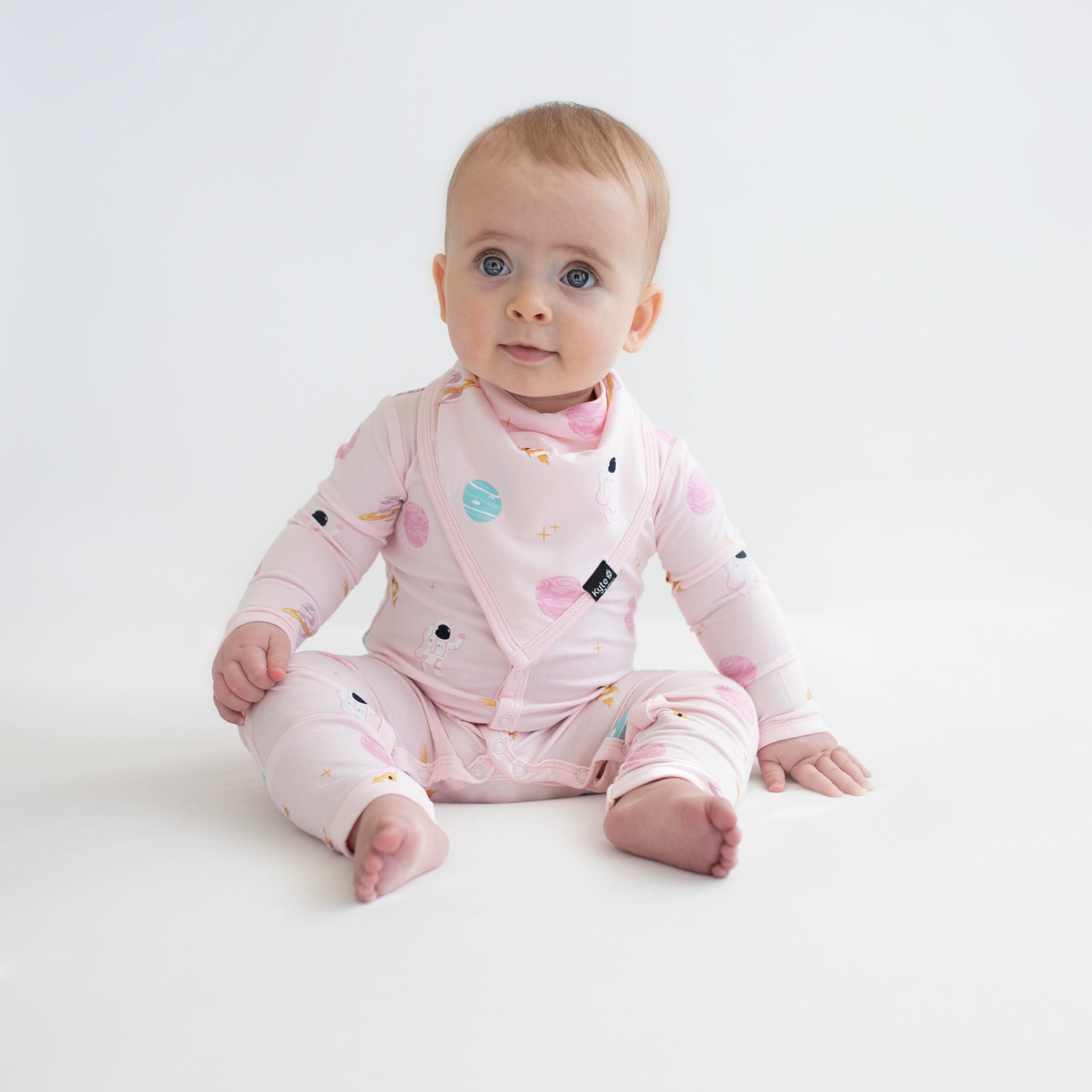 Kyte BABY Bib in Sakura Space