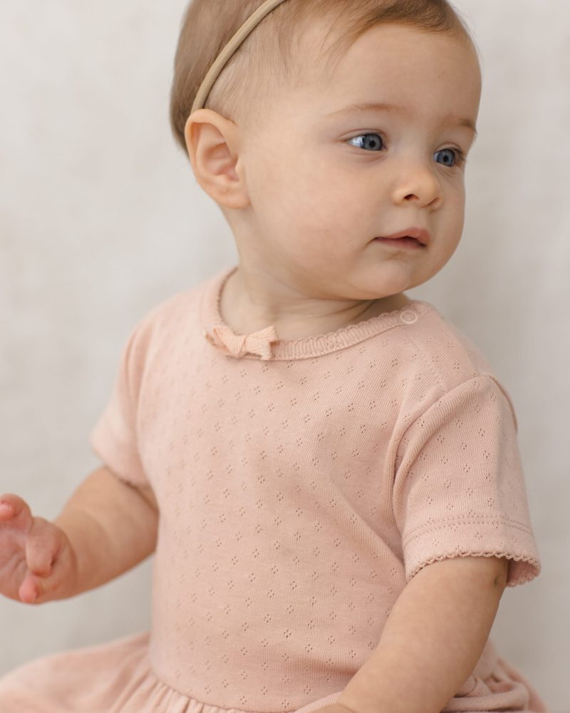 Pointelle Skirted Bodysuit In Melon from Quincy Mae Pointelle Skirted Bodysuit In Melon from Quincy Mae