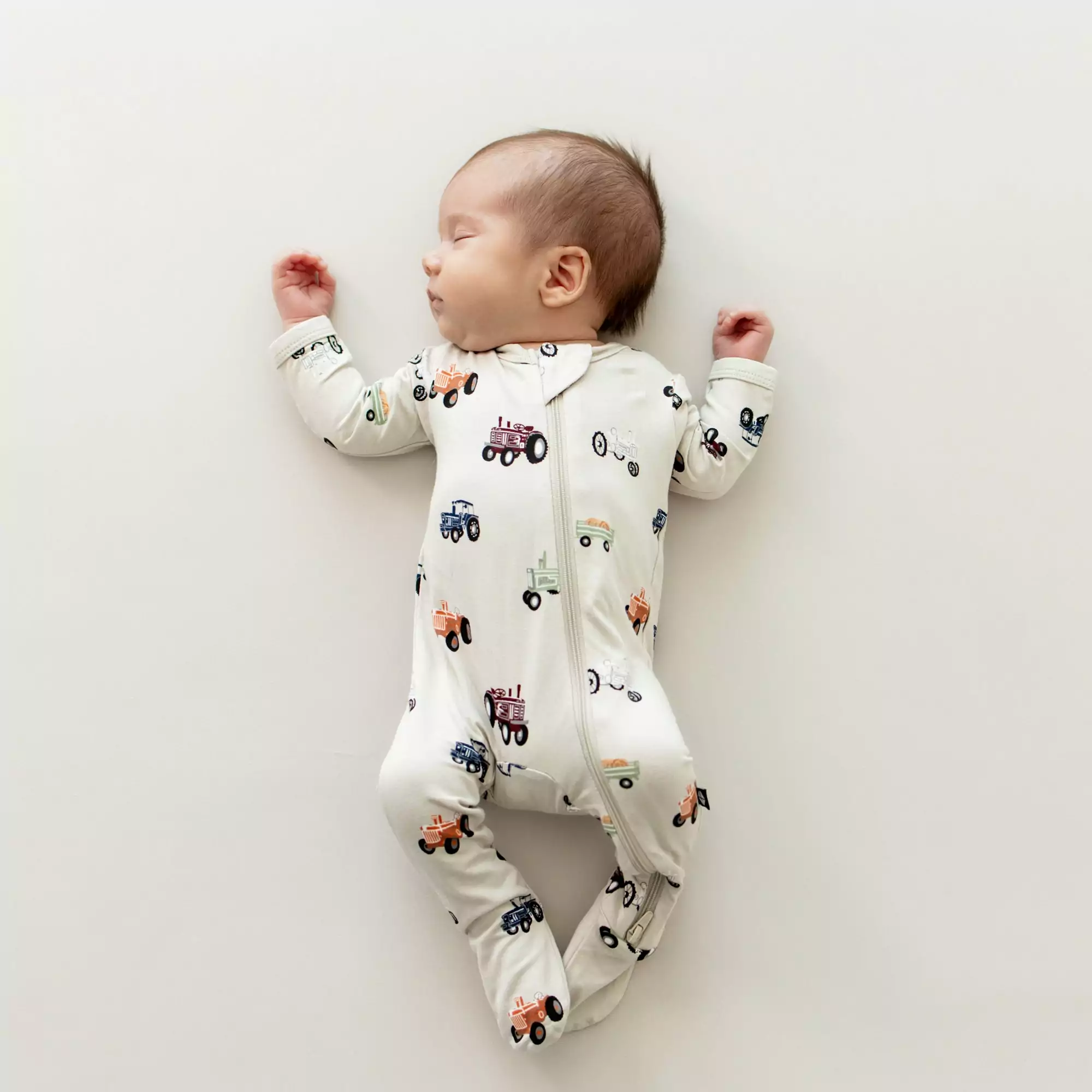 Kyte BABY Zippered Footie in Tractor